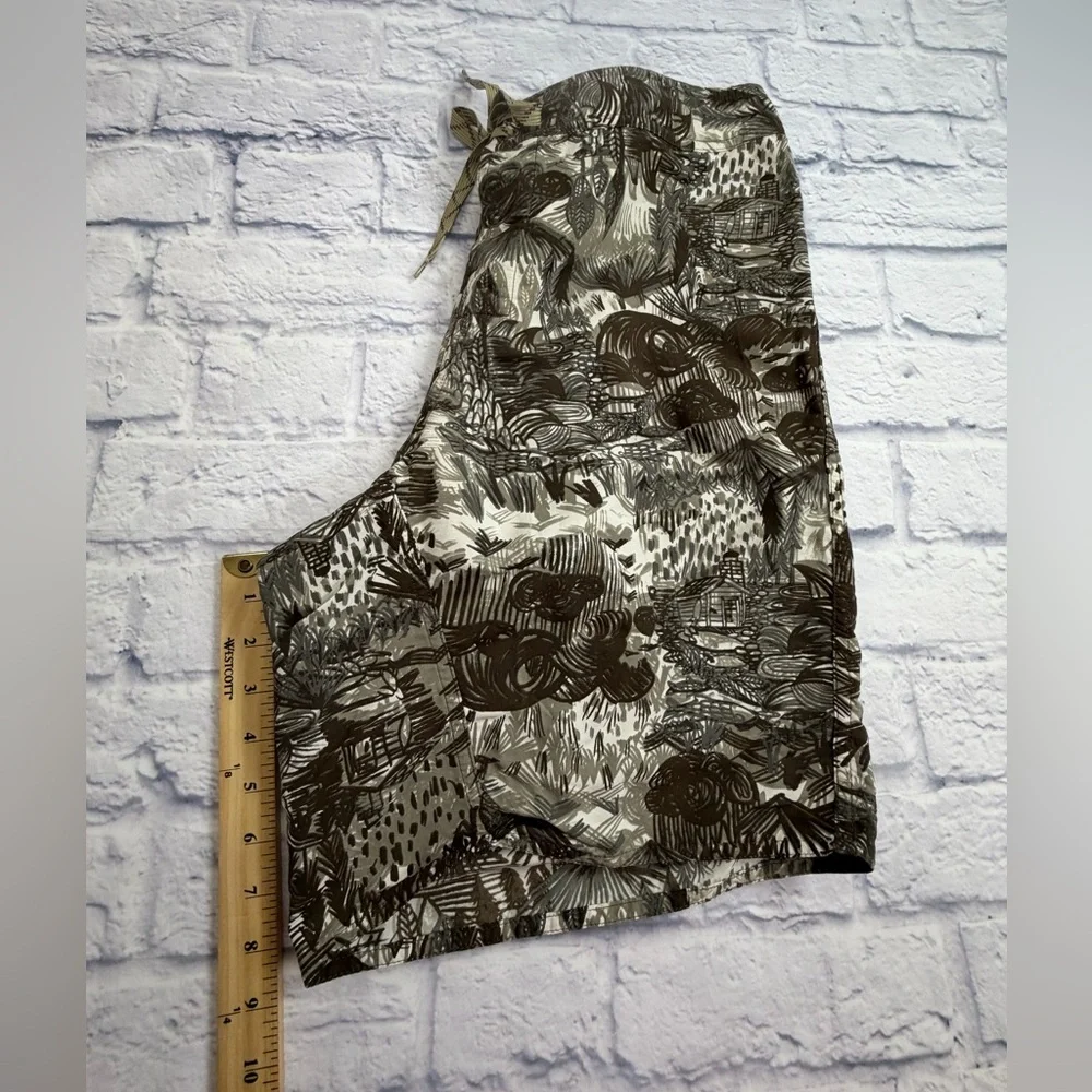 Patagonia Brown and Cream Patterned Board Shorts. Size 34/M.